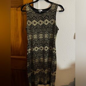 Elegant Dress for Prom Gold and Black
Very Shiny Size Medium